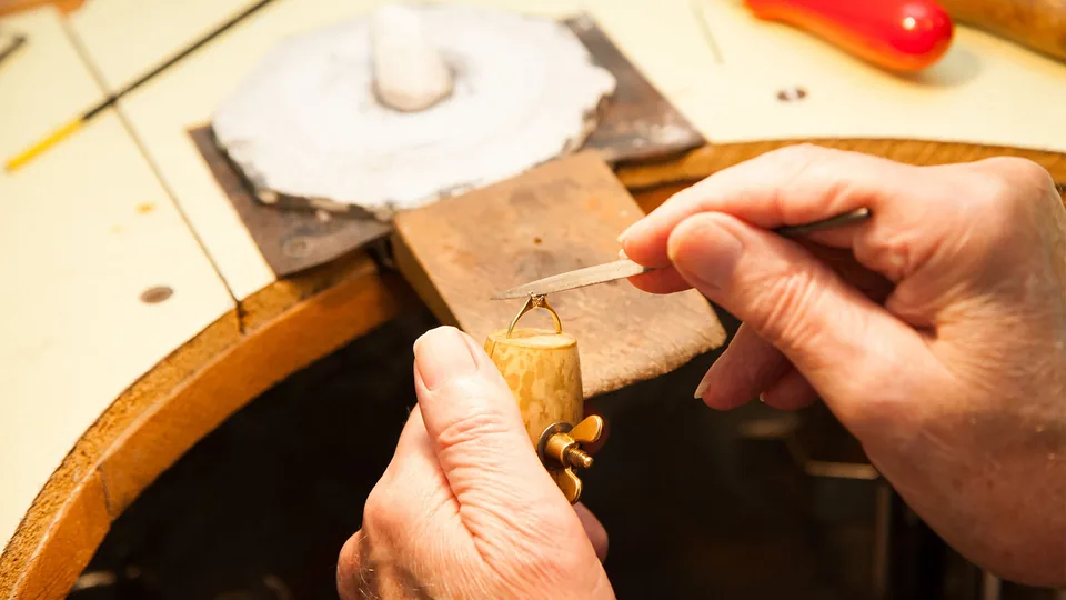 A ring being remodelled by hand